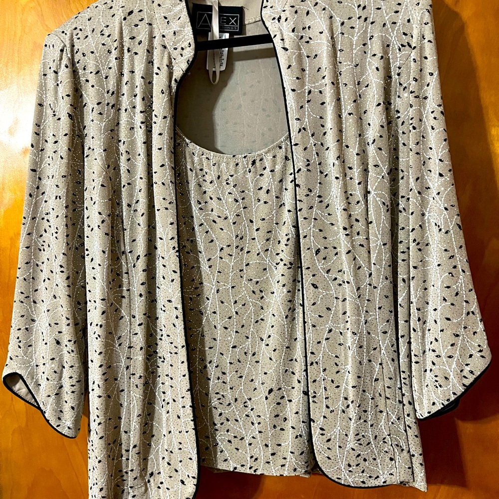 Beautiful dress top.  Jacket over tank
